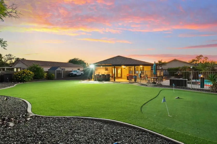 Make family memories in our large, private backyard with putting green